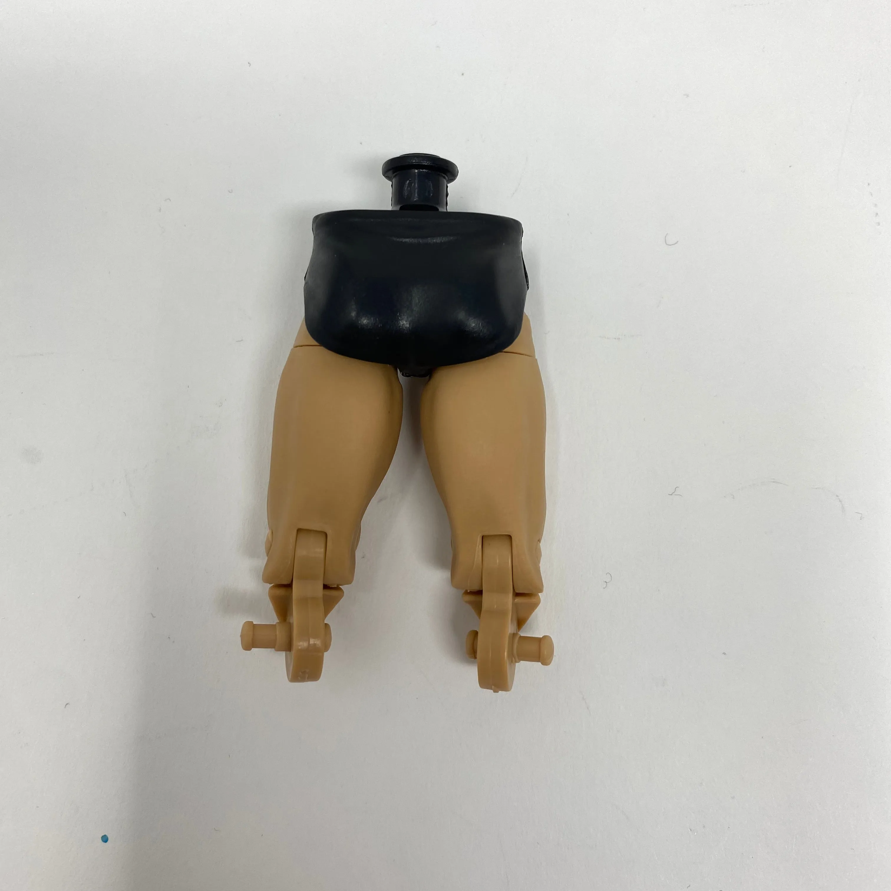 Black Trunks on Caucasian legs (smaller knee cap)